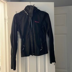 Black bench jacket with hot pink logo on collar. (Spring/fall)